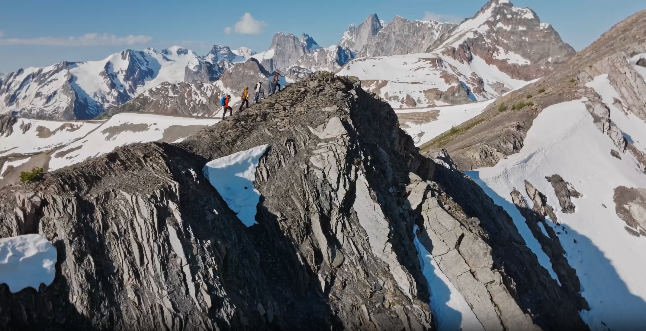 A group walking at the top of a mountain in BC, Canada